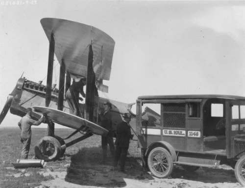 Historic scene illustrating early US airmail routes and the origins of flight watch and flight service operations
